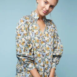 Long-Sleeved Maeve Smocking Top In Blue/Gold Nysa Liberty Fabric 17 Long-Sleeved Maeve Smocking Top In Blue/Gold Nysa Liberty Fabric -Modezzia Sales M F23 CATALOG S71377 32 D1 PDP